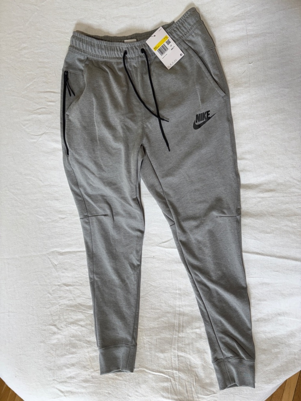 Nike men’s Gray Jogger Sweatpants with Black Drawstring